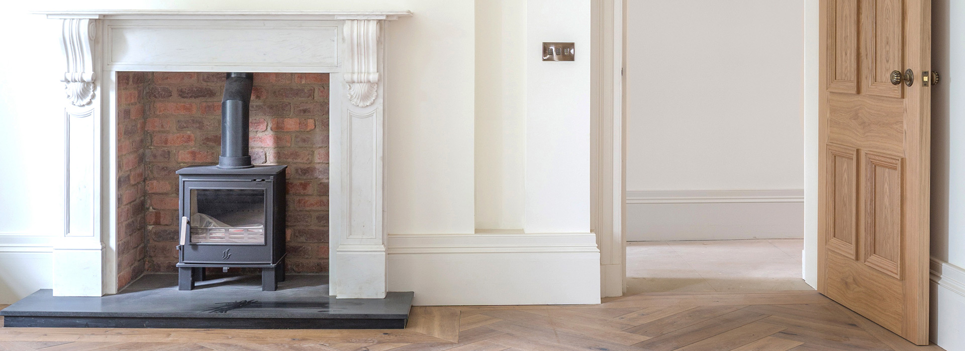 Log burning stove in a traditional home