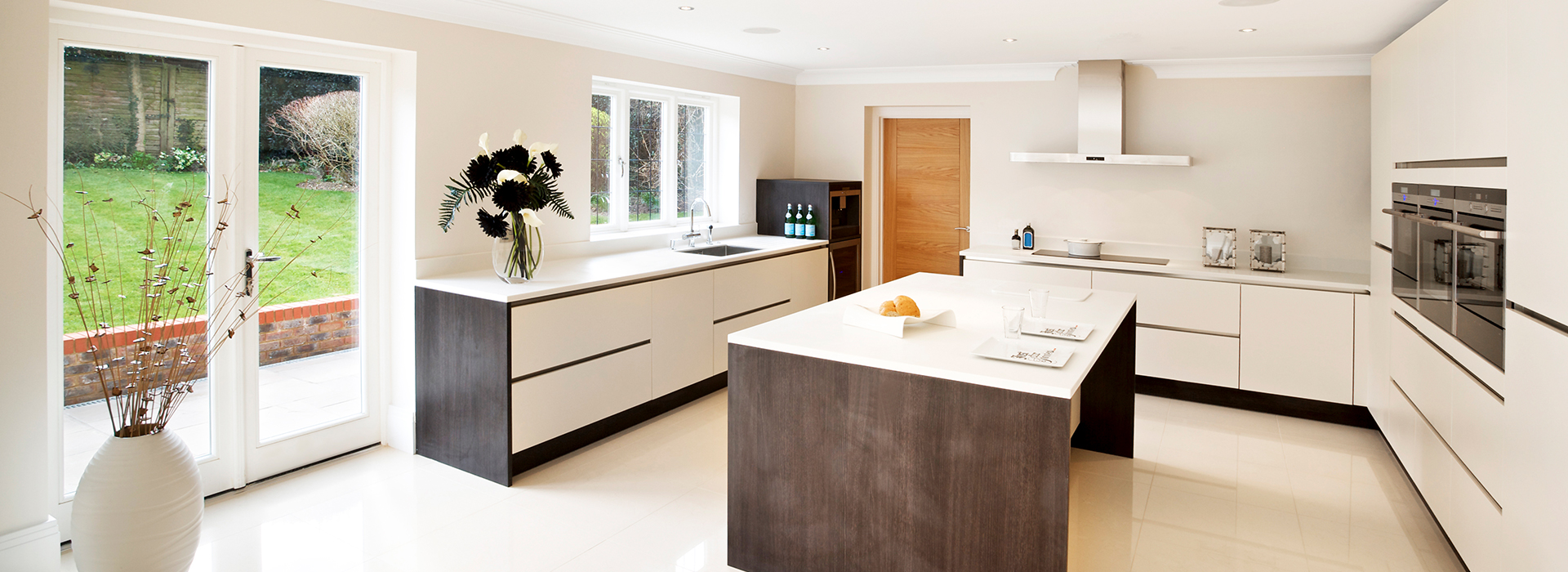 Open plan white kitchen
