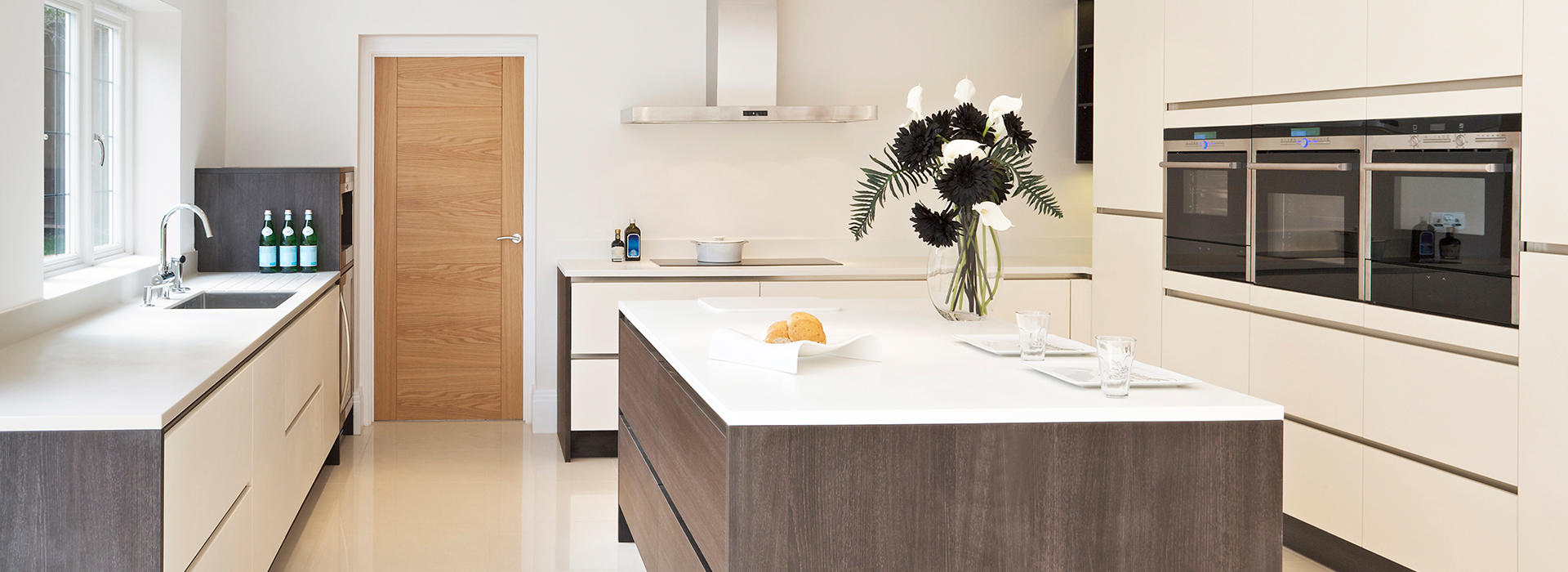 White and dark wood kitchen